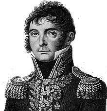 Black and white print shows a clean-shaven man with long sideburns. He wears the high collared and dark uniform of a French general officer of the early 1800s.