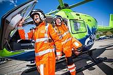 Specialist Paramedic in Critical Care and Critical Care Doctor exit the GWAAC helicopter
