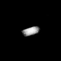 A small white object elongated from the bottom-left to top-right can be seen in the center.