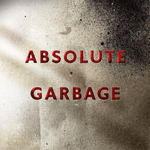 Against a metallic gray background lies in red letters the title "Absolute Garbage".
