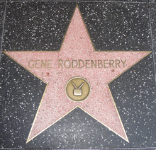 A star shaped paving slab, with the words "Gene Roddenberry" above the middle.