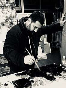 Georgy Totibadze in his artist workshop