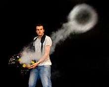 A demonstration of a smoke ring produced by a home-made vortex ring toy.