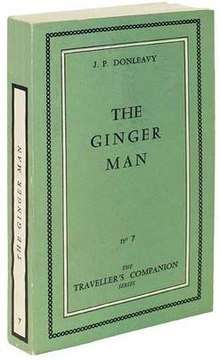 A green-covered book with The Ginger Man on the front