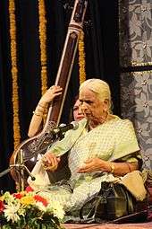 A photograph of an old woman wearing sari