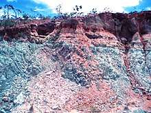 This image shows a rock and the occurrence of glauconitic siltstone in the Serra da Saudade ridge, in the Alto Paranaíba region, Minas Gerais state, Brazil.