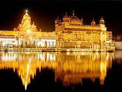 Sikhism's floating Golden Temple's lights shining in the night