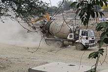 Gomti riverfront; heavy machinery over the riverbed