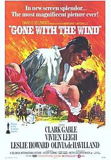 Poster shows Rhett Butler carrying Scarlett O'Hara against a backdrop of the Burning of Atlanta