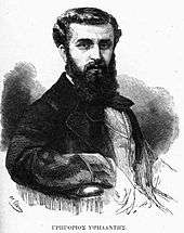 Black-and-white portrait of a bearded man