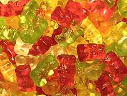 A pile of red, yellow, and green gummy bears