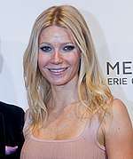 Photo of a blonde haired female smiling.