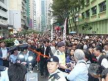Police officers were maintaining order in a large-scale protest in Hong Kong