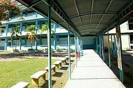 A covered walkway in the high school quadrangle