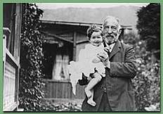 Photo of Hannah's grandfather, Max Arendt holding Hannah. Date unknown, probably aged 3-4