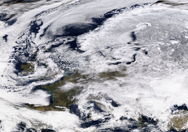 Satellite view showing Europe partially covered in snow under the influence of the anticyclonic cold wave named Hartmut or the "Beast from the East" on 27 February 2018