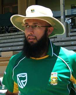 A portrait of a bearded man wearing South African ODI uniform