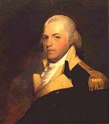 Portrait shows a white-haired man in a dark blue military coat with buff lapels and gold epaulettes.