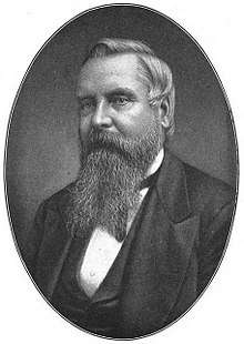 line drawing of a middle-aged man with long beard and wearing a business suit