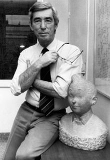 Hergé, with a bust of Tintin