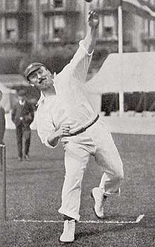 A cricketer bowling