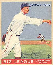 A baseball card image of a man with a strong nose in a white old-style baseball uniform and blue baseball cap