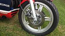 Silver Comstar wheel on an Honda RCB endurance race bike