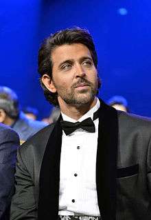 Hrithik Roshan is looking away from the camera