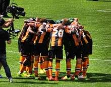 Hull players huddle before Leicester City at home, 2016
