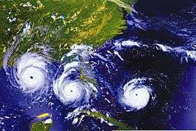 A combination of three satellite views of Hurricane Andrew: approaching Florida, emerging into the Gulf of Mexico, and approaching Louisiana