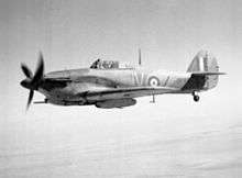A No. 6 Squadron Hawker Hurricane IID over the Western Desert during 1942.