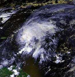 A satellite image of a weak hurricane near the Lesser Antilles