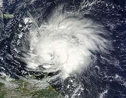 A satellite image of a well-developed tropical cyclone entering the Caribbean Sea.