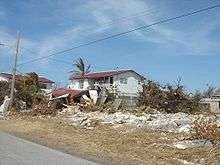 A house with part collapsed in Freeport, Bahamas