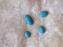 Polished turquoise stones