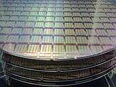 Semiconductor wafers, showing IPtronics designed ICs for parallel optical interconnects using a STMicroelectronics fabrication process