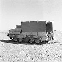 Crusader tank with a 'Sunshield' mimicking a truck in Operation Bertram