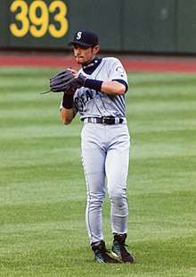 Ichiro Suzuki fielding a ball in the outfield as a Seattle Mariner