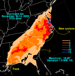 Map of the eastern United States depicting rainfall from a tropical cyclone. Accumulations are depicted by colored regions and areas without rain are left black.
