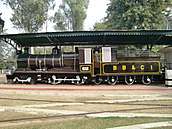 Black locomotive under cover