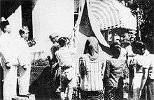 Raising the Indonesian flag during the ceremony