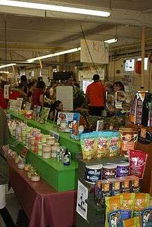 A setup of coffee and bath/body products inside the market.