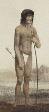 A lithograph of a man wearing a loincloth and holding a bow in one hand and an arrow in the other