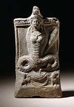 Statue of a snake with the upper torso and head of a woman