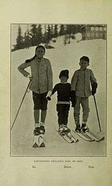 three children on skis