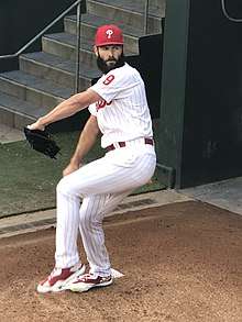 Jake Arrieta performing a warmup pitch for the Chicago Cubs in 2018