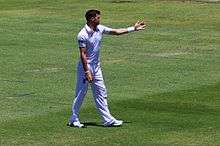 A photograph of James Anderson bowling against Australia in 2013–14