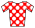 A red jersey with white polka dots.