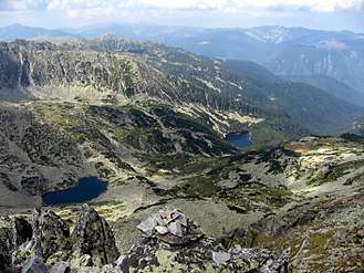 Aerial photo of mountains, valley and two lakes