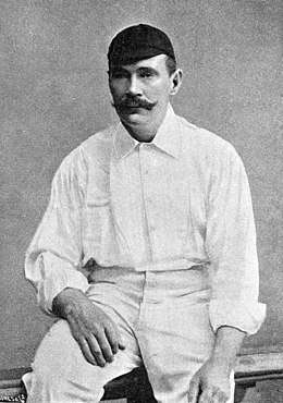 A man dressed in cricket whites